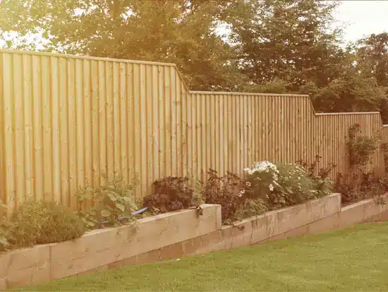 feather edged fencing and sleeper bed